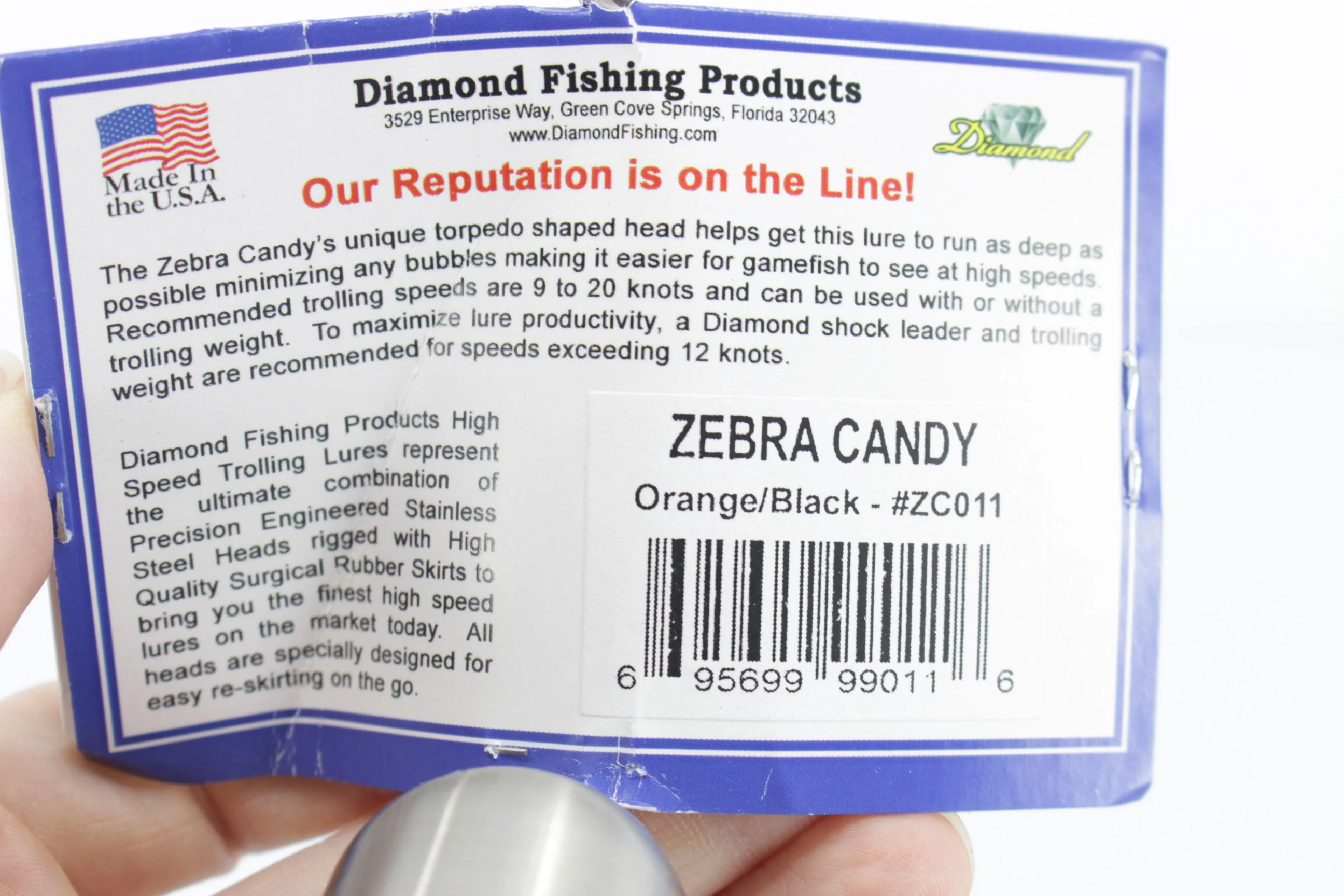 Diamond Fishing Chrome Hi-Speed Zebra Candy Bullet 10" 20oz Skirted Orange-Black - Image 4